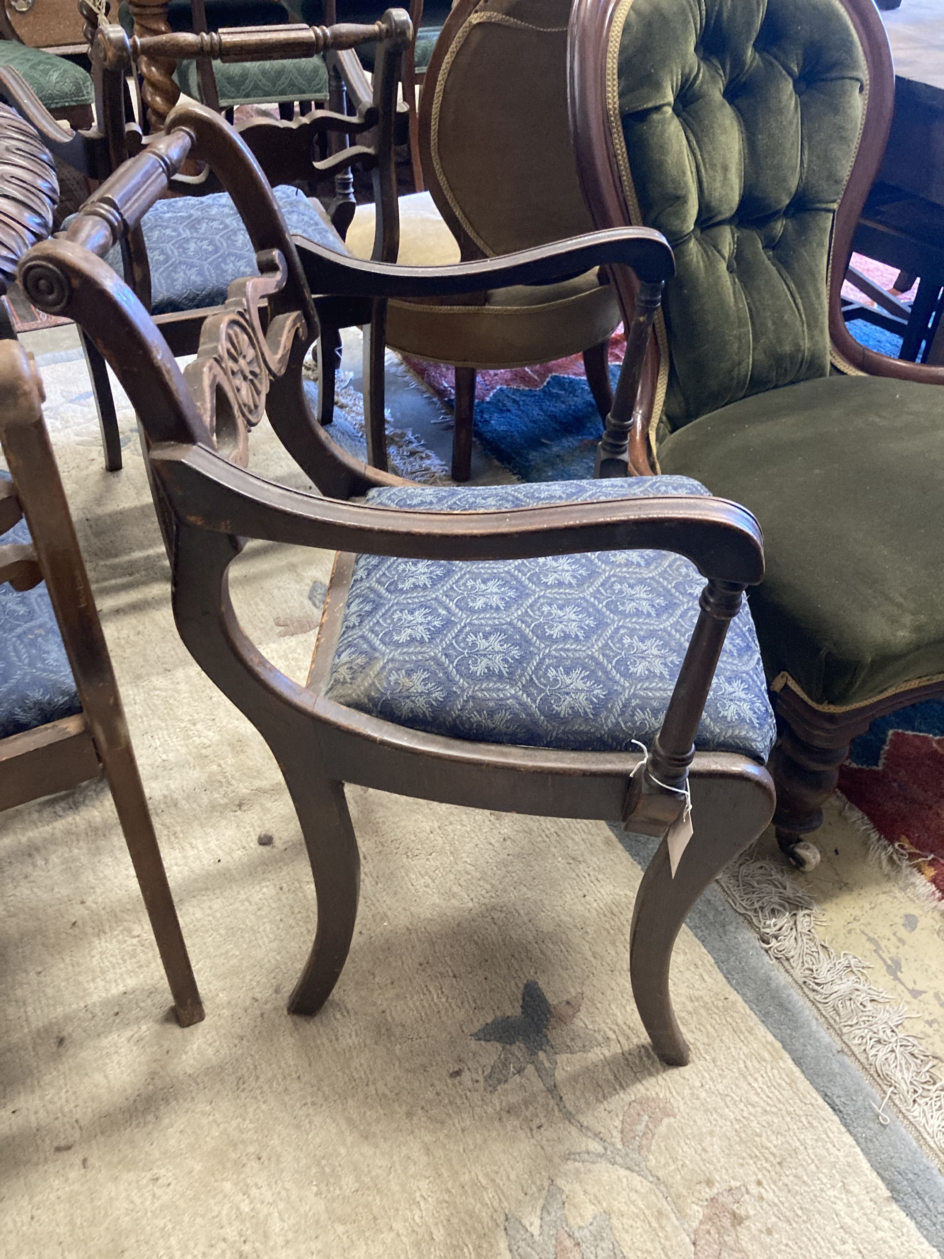 A set of eight Regency style beech dining chairs, two with arms